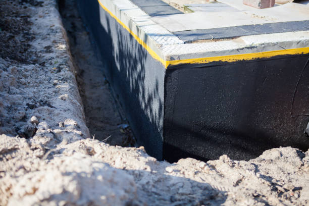 Professional Interior Drainage System technician working in Burke, VA